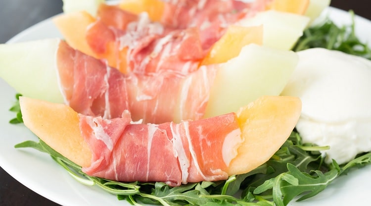 Cantaloupe Slices Wrapped in Prosciutto